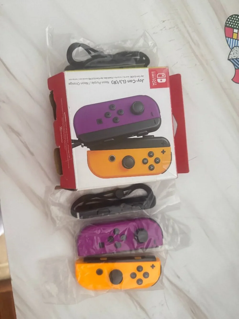 Open Box Switch Joy-Con Controller 2 Pack Neon Purple and Neon Orange